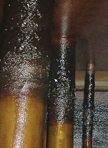 Figure 1. An advanced case of deposits accumulating on metal surfaces above the oil level