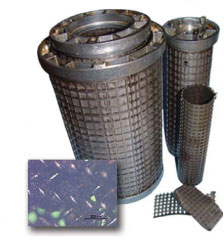 Figure 5. Plugged filter from the turbo-generator and filter mesh with black and brown shiny residue (200x magnification) Figure 5. Plugged filter from the turbo-generator and filter mesh with black and brown shiny residue (200x magnification)