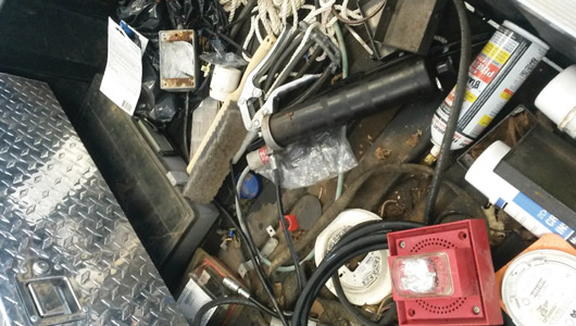 Can you find the grease gun in this picture? Can you find the grease gun in this picture?