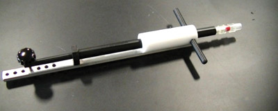 Figure 4: Grease sampler in T-handle extension Figure 4: Grease sampler in T-handle extension