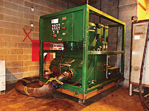 A large pump/filtration unit provided the circulation for the system flush. A large pump/filtration unit provided the circulation for the system flush.