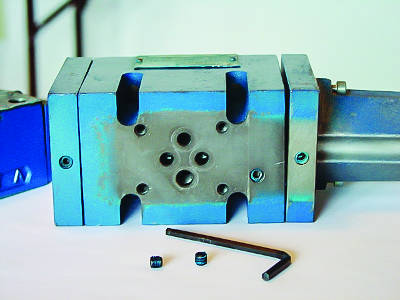 Figure 5. Pilot plugs can be removed with an Allen wrench. Figure 5. Pilot plugs can be removed with an Allen wrench.