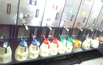 Figure 3. Dedicated colour-coded oil dispensing containers Figure 3. Dedicated colour-coded oil dispensing containers