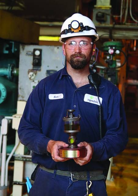 Ingredion employee with John R. Battle Award